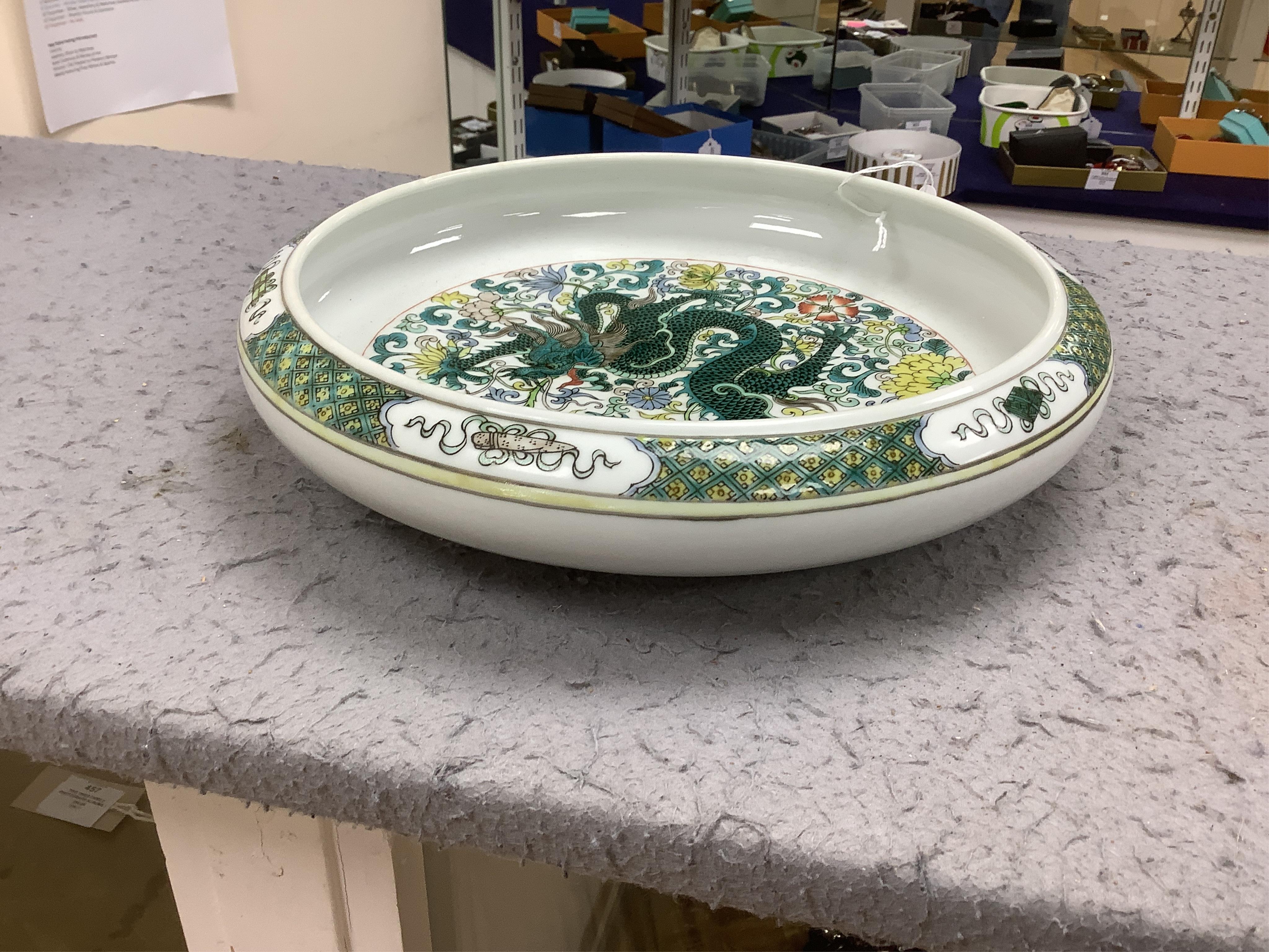 A Chinese famille verte dragon bowl, 29cm in diameter. Condition - good